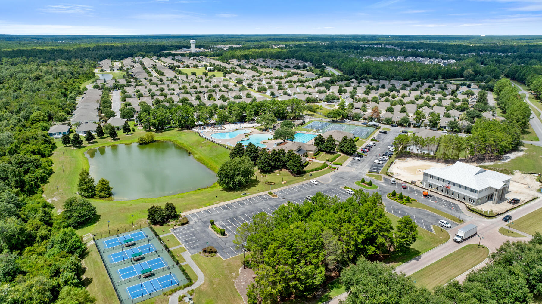 301 Mill Pond Cove Freeport, FL 32439 - Photo 50 of 55 an aerial view of a house with a garden