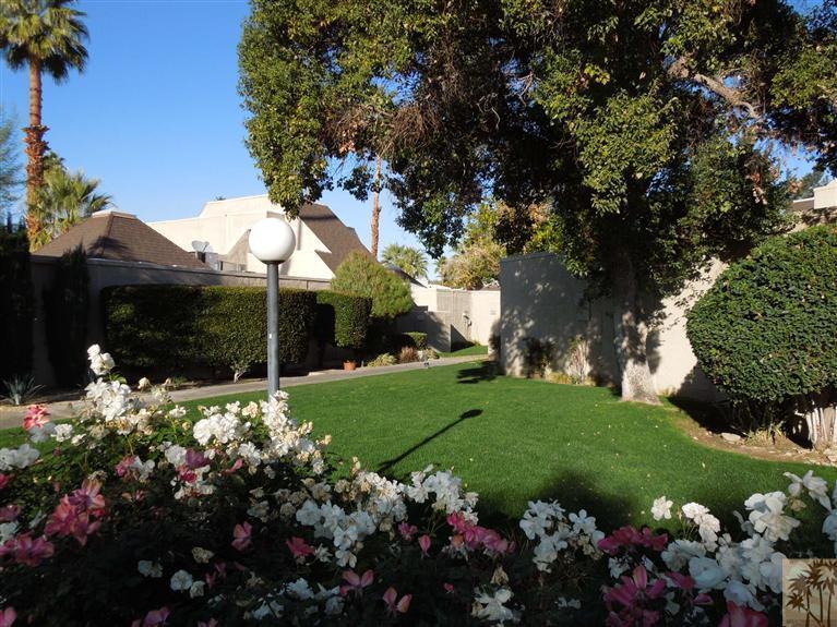 71948 Eleanora Lane Rancho Mirage, CA 92270 - Photo 15 of 15 a view of a house with a yard and garden