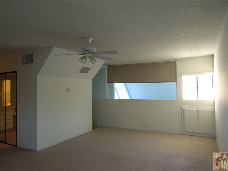 71948 Eleanora Lane Rancho Mirage, CA 92270 - Photo 9 of 15 an empty room with windows