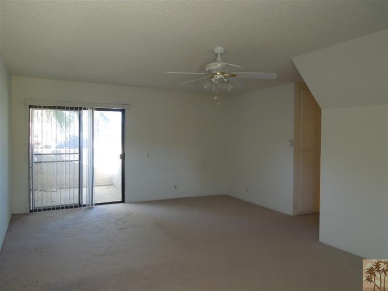 71948 Eleanora Lane Rancho Mirage, CA 92270 - Photo 10 of 15 an empty room with chandelier fan