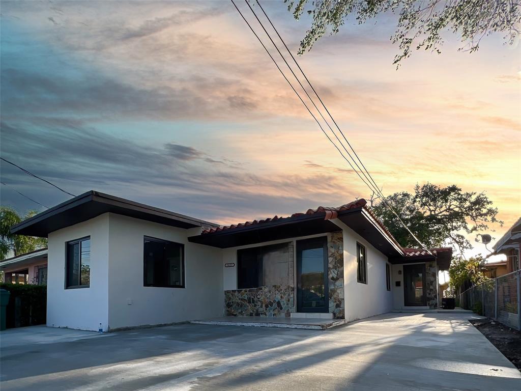 a view of a house with a patio