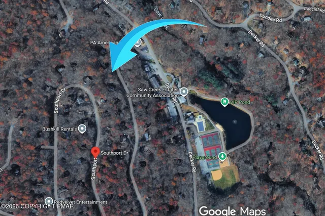 an aerial view of a pool patio swimming pool and outdoor seating