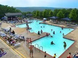a view of a house with snow on the yard