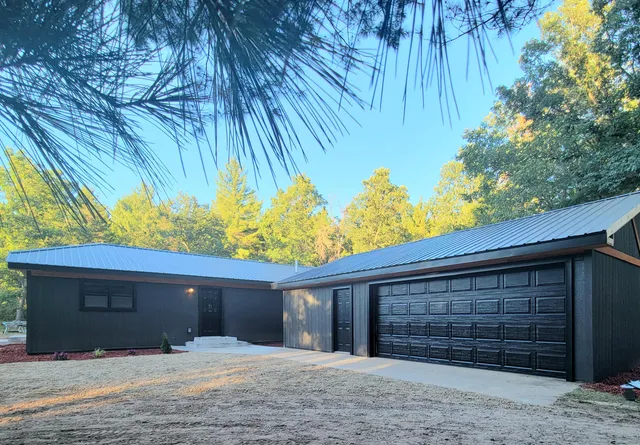 $350,000 | 22510 12 Mile Road, Irons, MI 49644