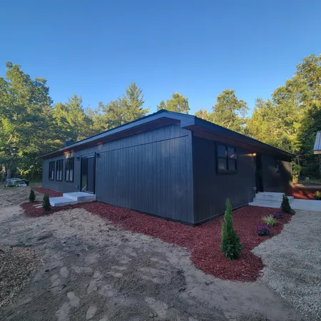 $350,000 | 22510 12 Mile Road, Irons, MI 49644