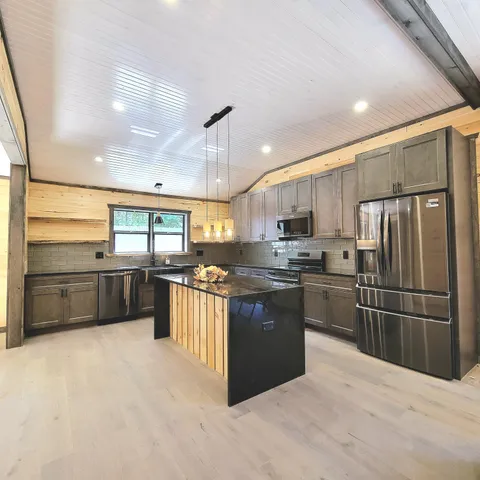 $350,000 | 22510 12 Mile Road, Irons, MI 49644