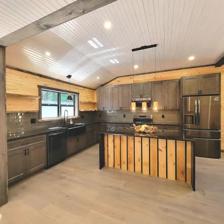 $350,000 | 22510 12 Mile Road, Irons, MI 49644