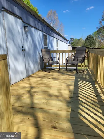 a view of swimming pool with a yard