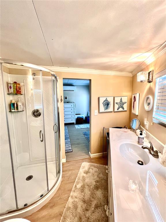 72 4th Avenue, Unit 72 Venice, FL 34285 - Photo 13 of 29 a bathroom with a tub sink and shower