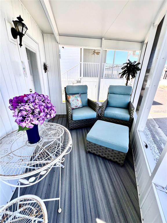 72 4th Avenue, Unit 72 Venice, FL 34285 - Photo 14 of 29 a living room with furniture and wooden floor