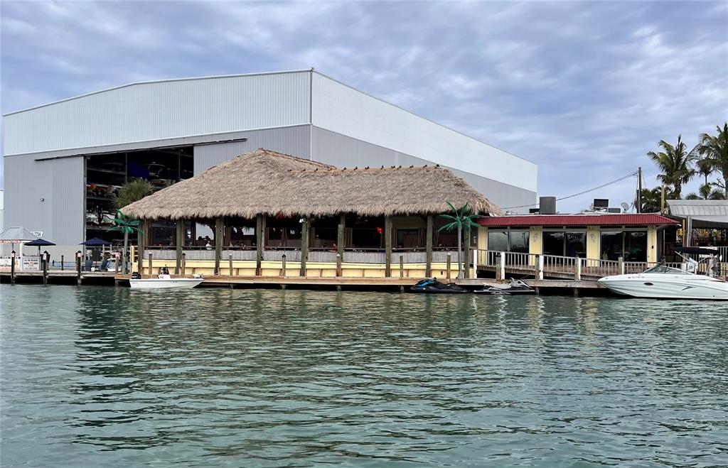 72 4th Avenue, Unit 72 Venice, FL 34285 - Photo 29 of 29 a view of a swimming pool with outdoor seating and deck