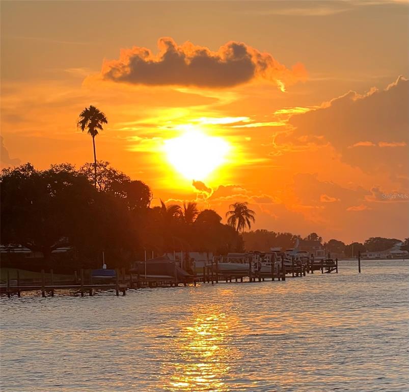 72 4th Avenue, Unit 72 Venice, FL 34285 - Photo 3 of 29 a view of a lake and a mountain view