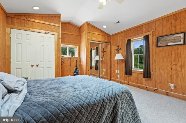 a kitchen with stainless steel appliances granite countertop a refrigerator sink and cabinets