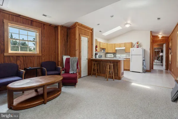 a bedroom with a bed and furniture