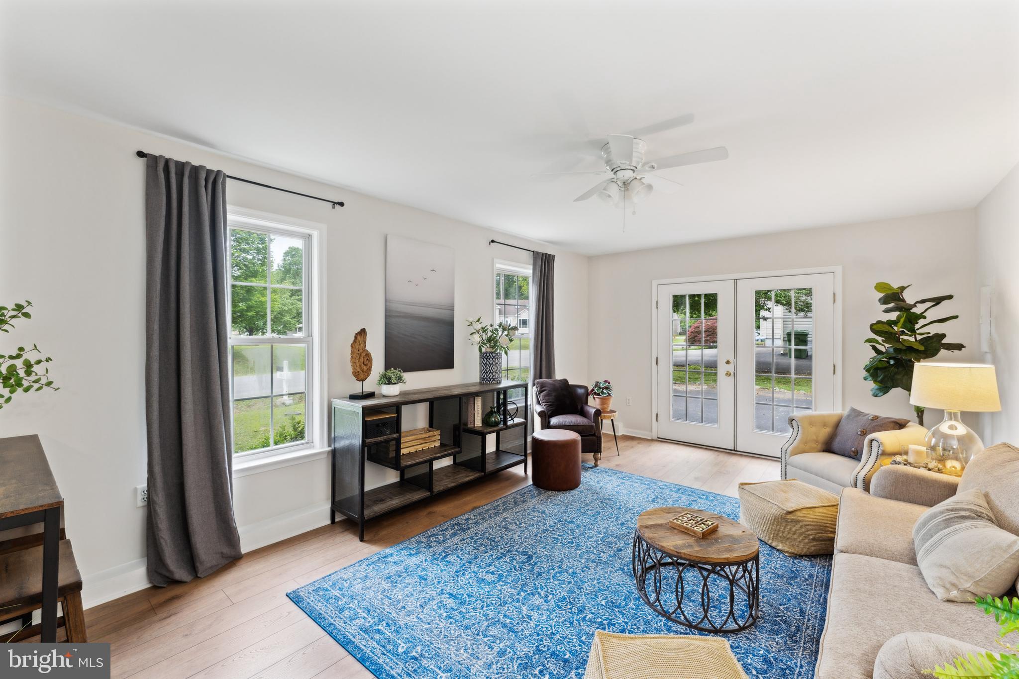 Lower level family room w/ doors to outside