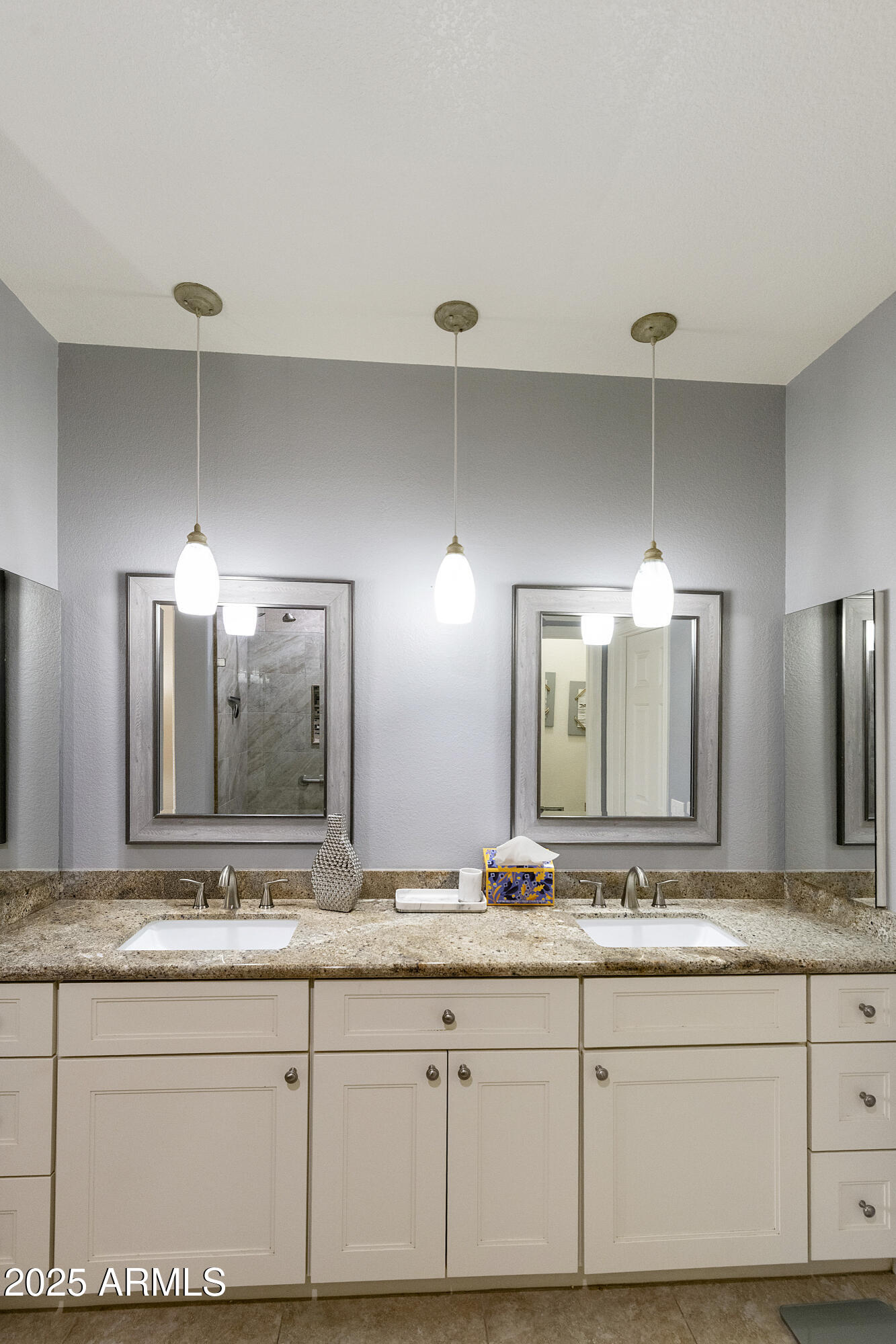 23745 South Vacation Way Sun Lakes, AZ 85248 - Photo 21 of 52 a bathroom with a granite countertop sink and a large mirror