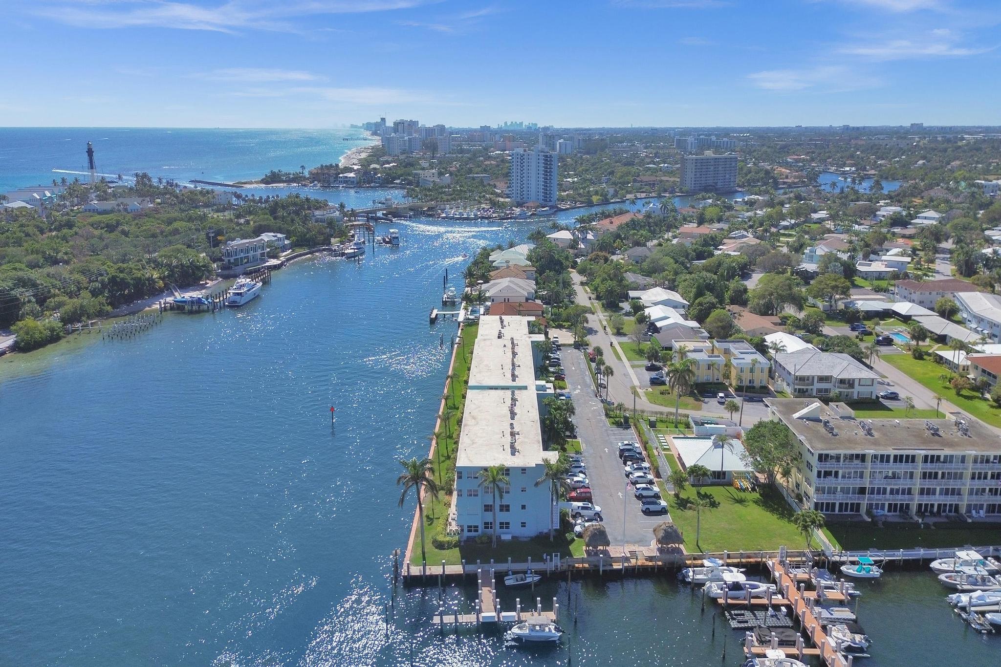 2772 Northeast 30th Avenue, Unit 6C Lighthouse Point, FL 33064 - Photo 2 of 16 an aerial view of residential building and lake