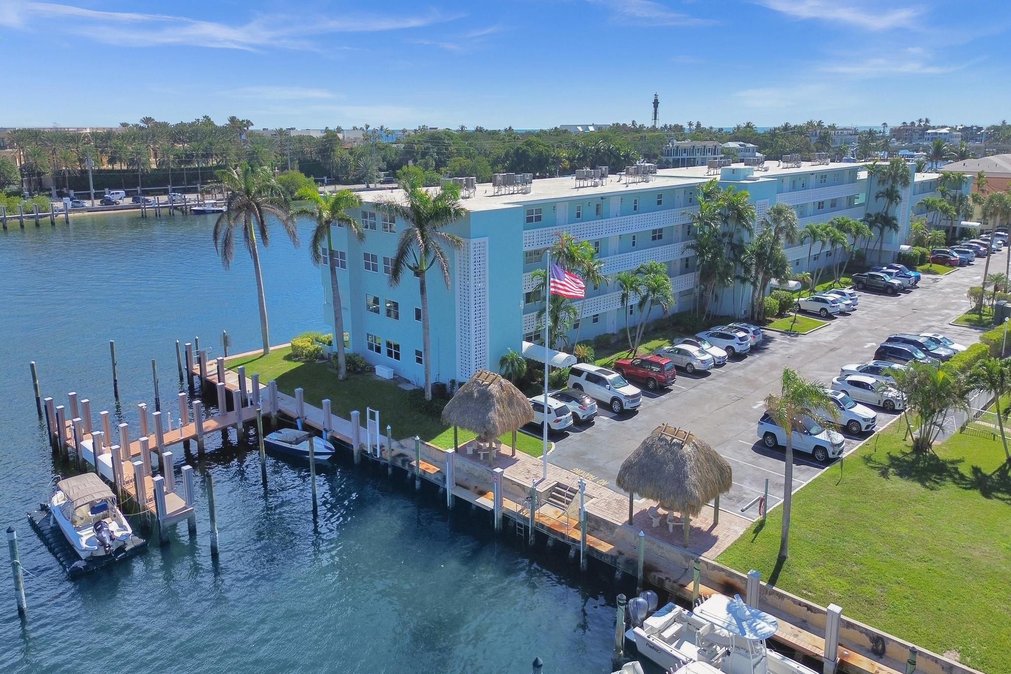 2772 Northeast 30th Avenue, Unit 6C Lighthouse Point, FL 33064 - Photo 3 of 16 an aerial view of a house yard swimming pool and outdoor seating