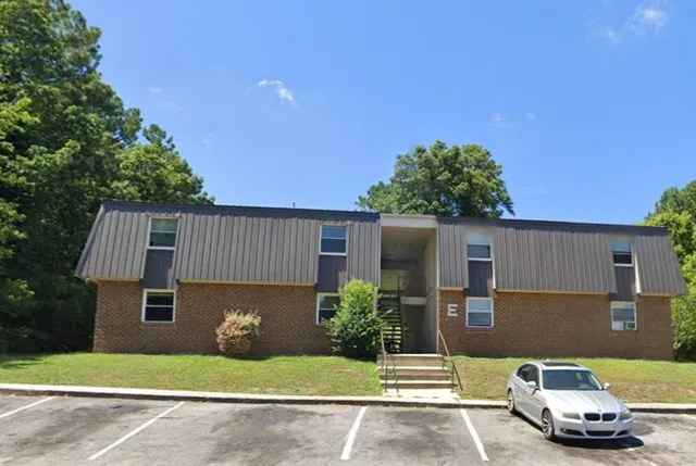 a car parked in front of a house