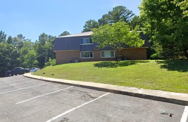 a view of a house with a swimming pool