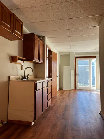 a bathroom with a tub and shower