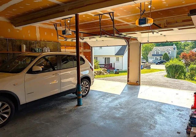 a view of a cars park in front of house