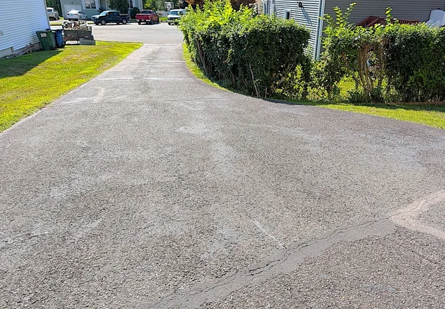 a view of swimming pool with outdoor seating and garden