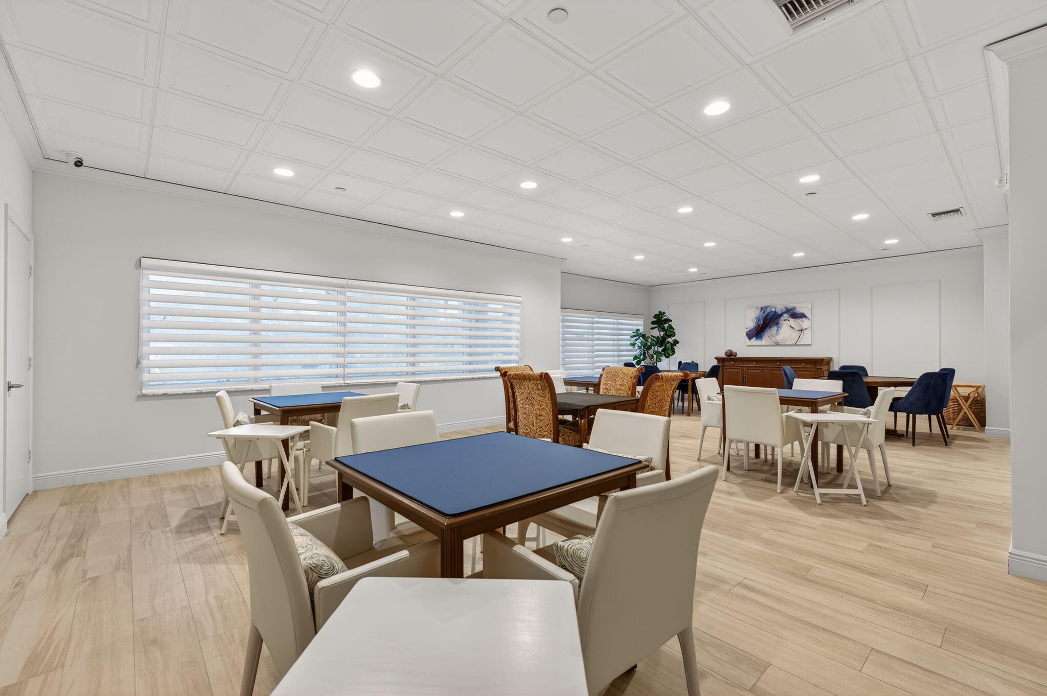 4301 North Ocean Boulevard, Unit 1206 Boca Raton, FL 33431 - Photo 47 of 71 a view of a dining room with furniture window and wooden floor