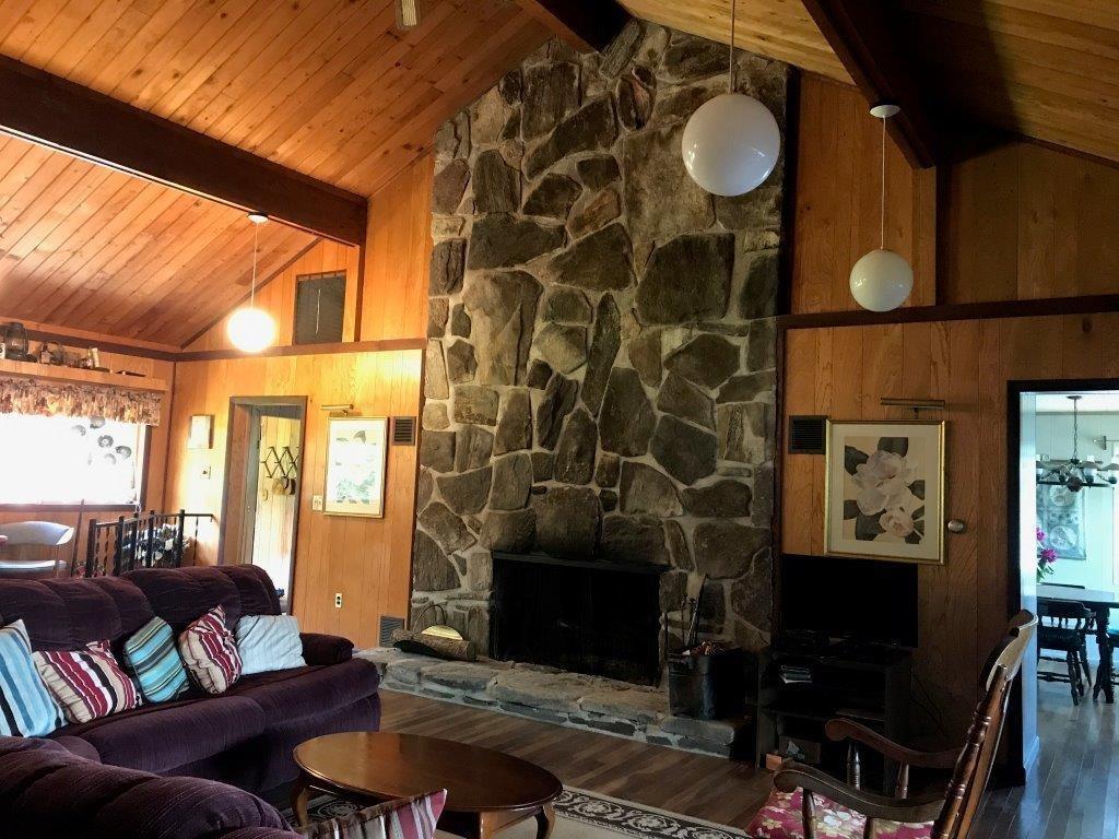69 41st Fire Road South China, ME 04358 - Photo 10 of 29 LIVING ROOM WITH STONE FIREPLACE