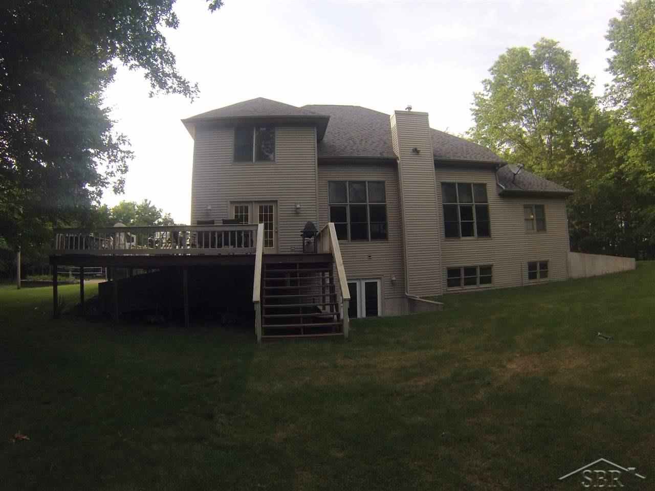 18097 West Townline Road St. Charles, MI 48655 - Photo 32 of 35 572 square foot of wrap-around deck!