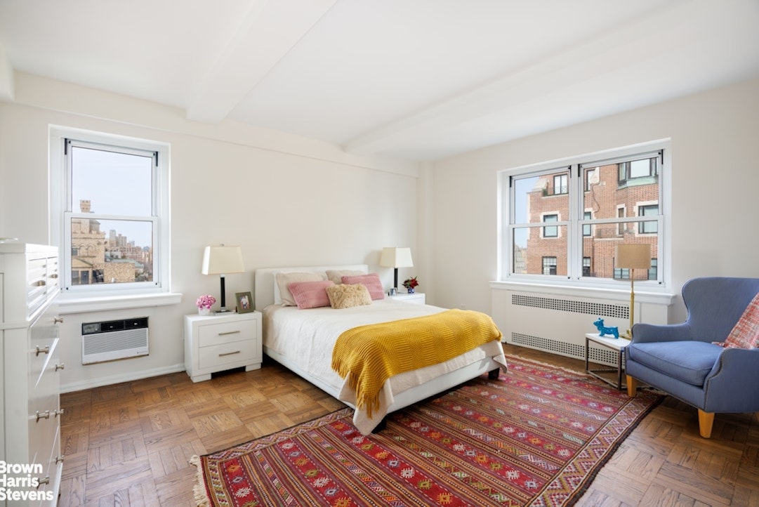 710 Park Avenue, Unit PH20B Manhattan, NY 10021 - Photo 11 of 20 a bedroom with a bed and a window