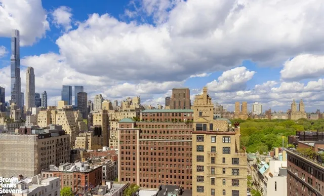 a view of balcony with couch and outdoor seating