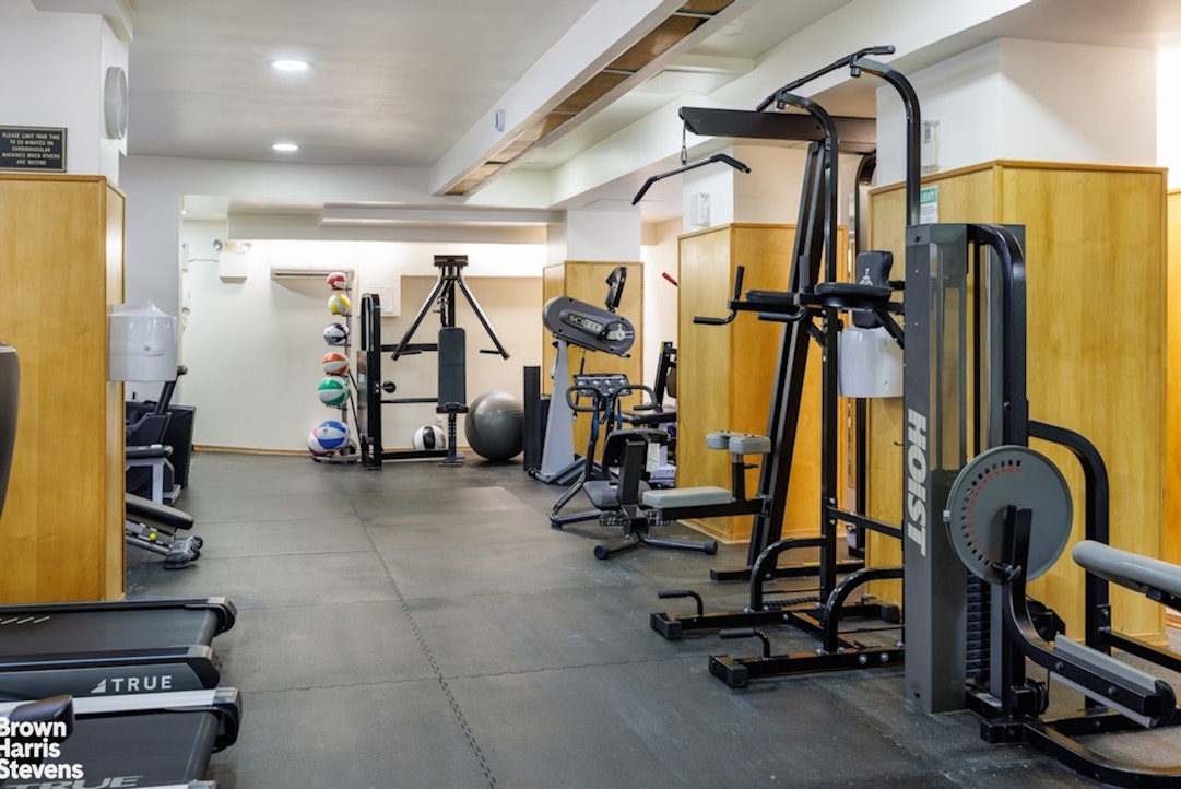 710 Park Avenue, Unit PH20B Manhattan, NY 10021 - Photo 19 of 20 a view of a room with gym equipment