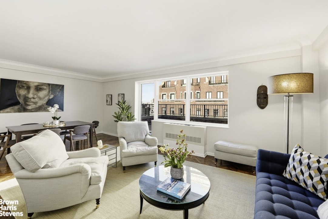 710 Park Avenue, Unit PH20B Manhattan, NY 10021 - Photo 2 of 20 a living room with furniture and a large window