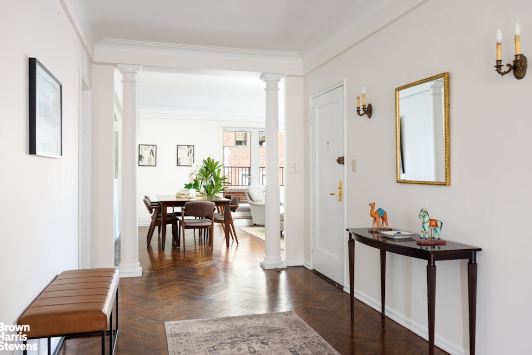 710 Park Avenue, Unit PH20B Manhattan, NY 10021 - Photo 9 of 20 a dining room with furniture and wooden floor