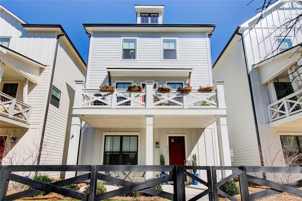 a view of a patio with table and chairs
