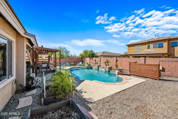 a view of a house with a yard porch and sitting area