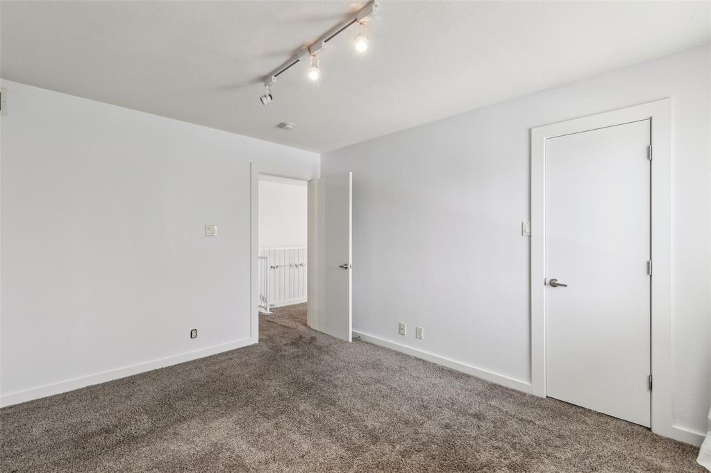 4777 Cedar Springs Road, Unit 6N Dallas, TX 75219 - Photo 10 of 19 a view of an empty room