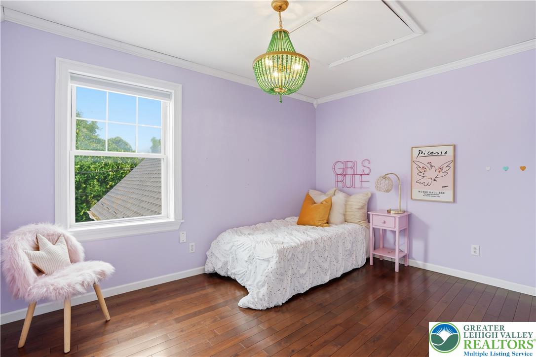 2014 Linden Street Bethlehem, PA 18017 - Photo 46 of 85 Hardwood floors and a bright window frame this inviting, light-filled sleeping space.