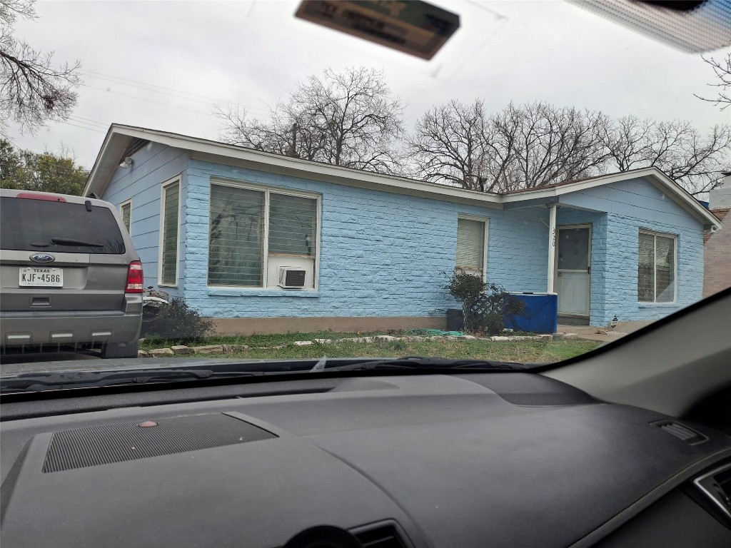 7520 Delafield Lane Austin, TX 78752 - Photo 9 of 9 a view of a house with a cars park