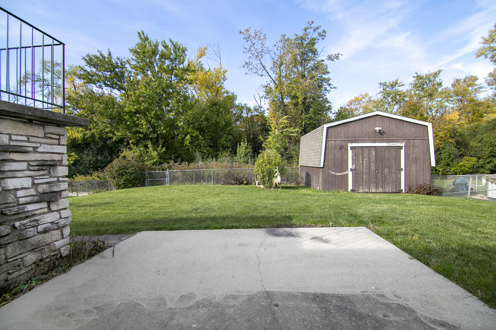 15124 Chestnut Lane Oak Forest, IL 60452 - Photo 16 of 18 a front view of a house with a yard