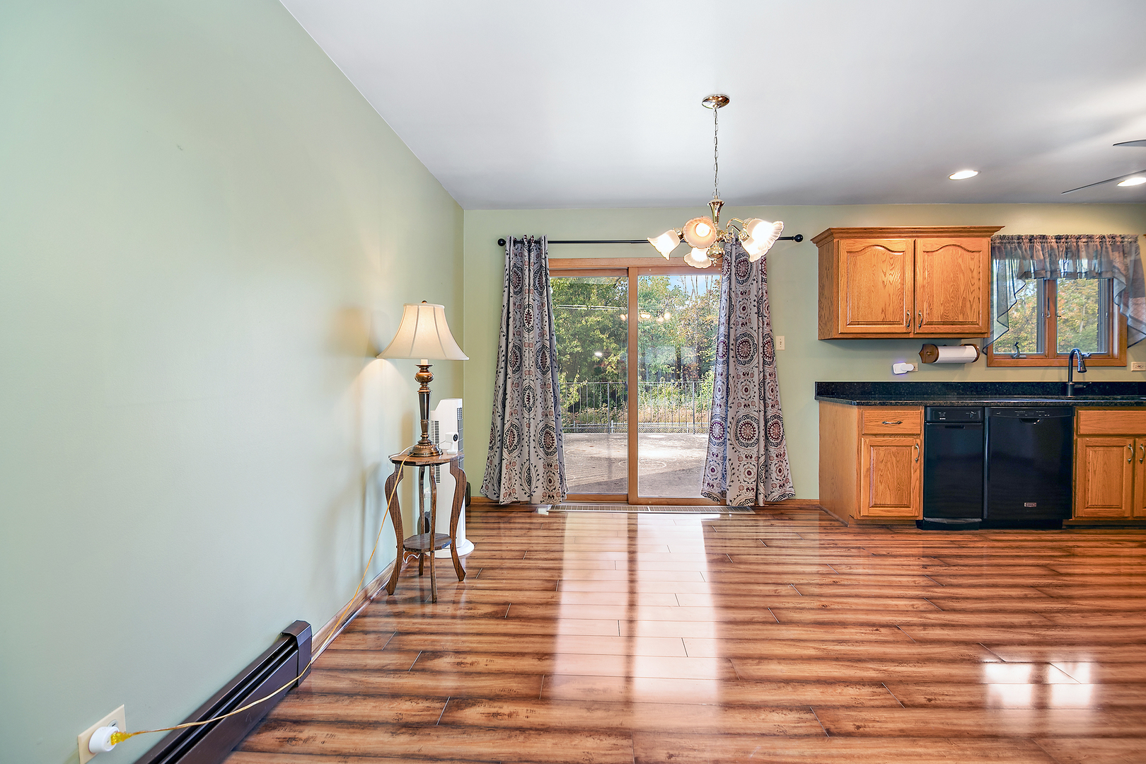 15124 Chestnut Lane Oak Forest, IL 60452 - Photo 4 of 18 a view of a living room a fireplace and windows