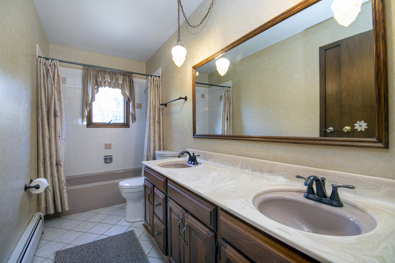15124 Chestnut Lane Oak Forest, IL 60452 - Photo 9 of 18 a bathroom with a sink and a mirror