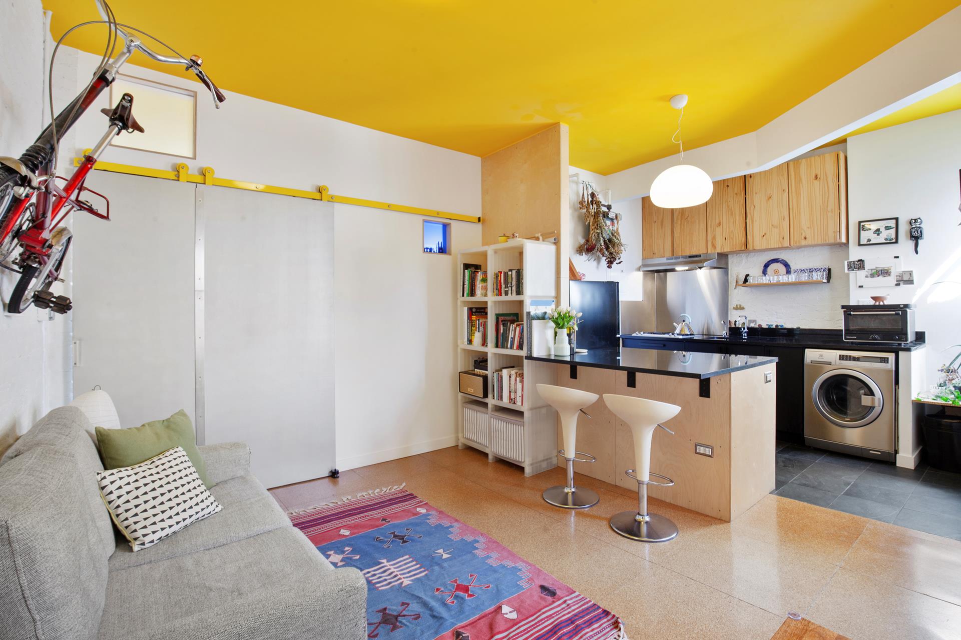 30 Macombs Place, Unit 62 Manhattan, NY 10039 - Photo 2 of 7 a view of a workspace with furniture and a window