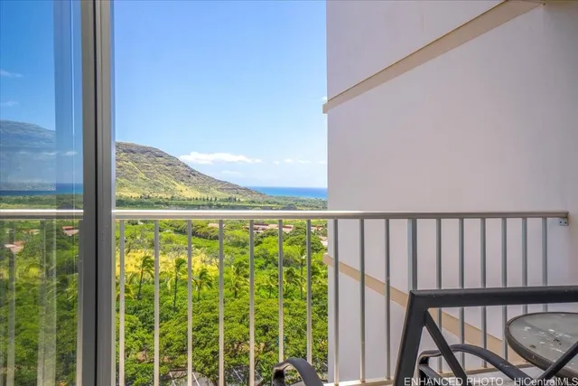 a view of a balcony with chair