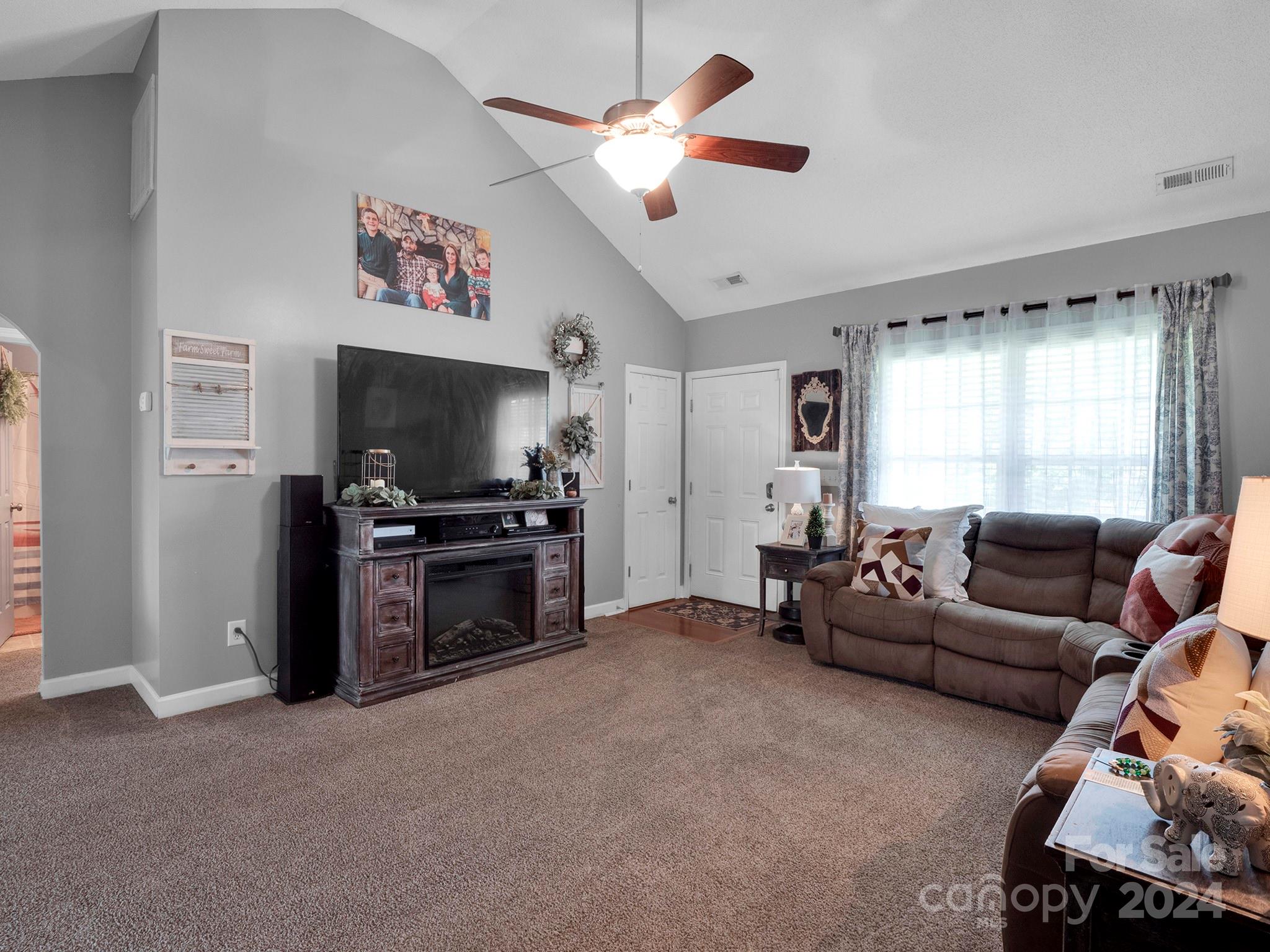 321 Springlake Road York, SC 29745 - Photo 7 of 34 a living room with furniture and a flat screen tv