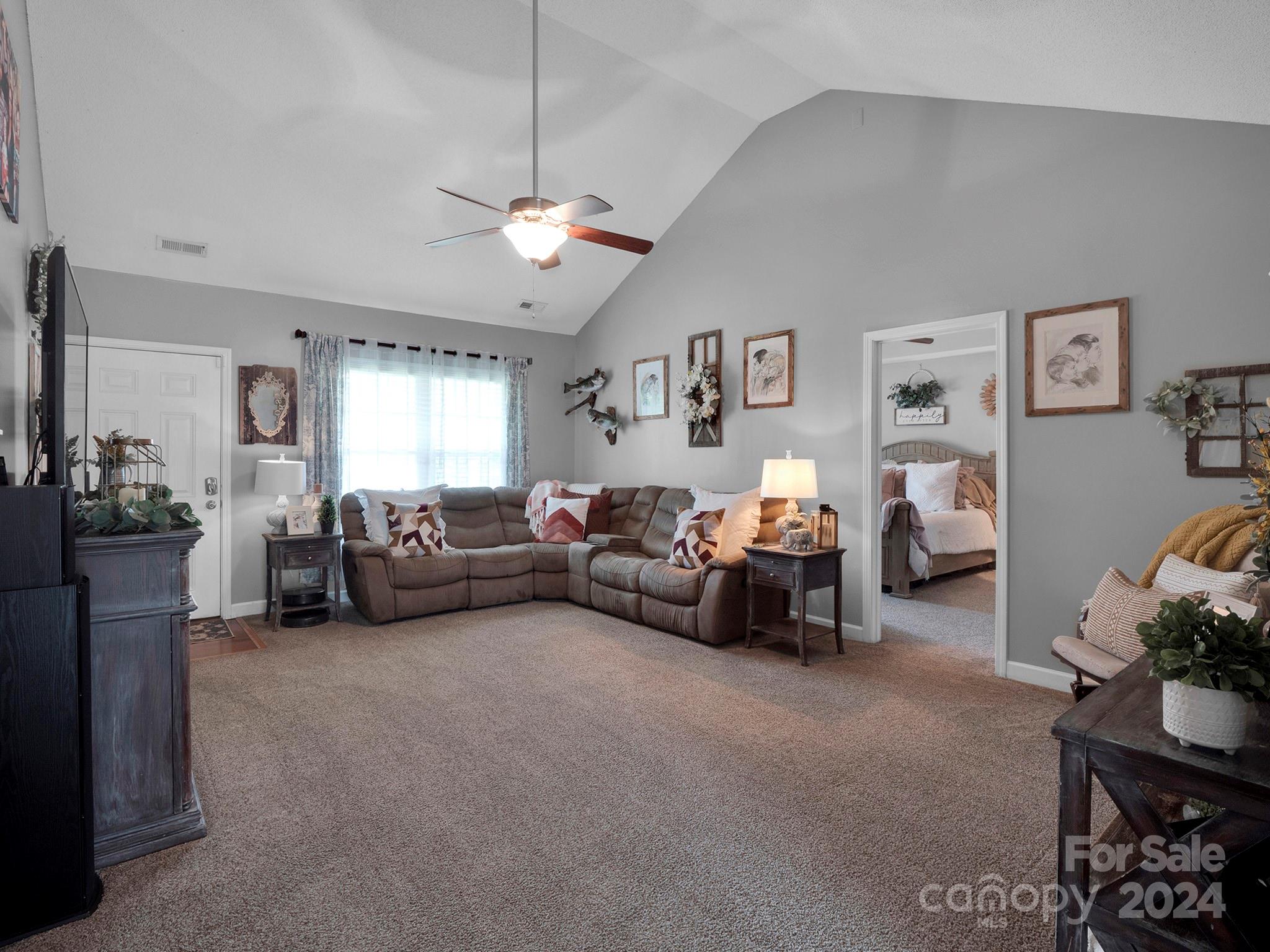 321 Springlake Road York, SC 29745 - Photo 8 of 34 a living room with furniture and a chandelier