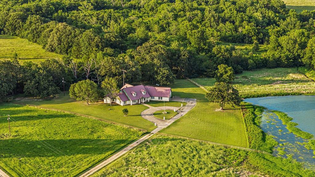 2290 County Road Honey Grove, TX 75446 - Photo 2 of 37 a view of an indoor swimming pool