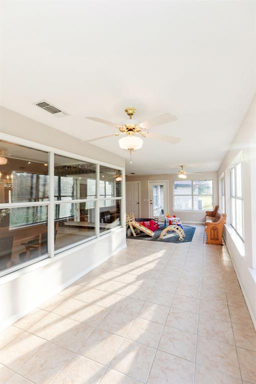 2290 County Road Honey Grove, TX 75446 - Photo 26 of 37 a view of a livingroom with furniture and a ceiling fan
