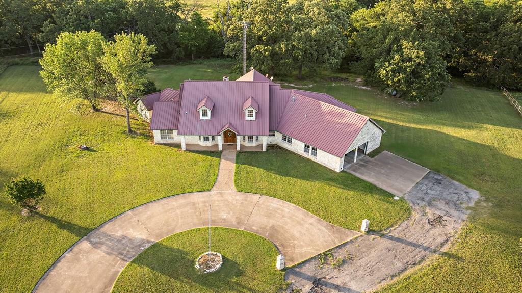 2290 County Road Honey Grove, TX 75446 - Photo 33 of 37 an aerial view of a house with a garden